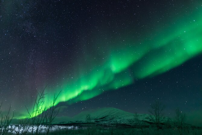 Abisko Northern Lights Tour with Photographer - Staying in Abisko or Driving Toward Kiruna