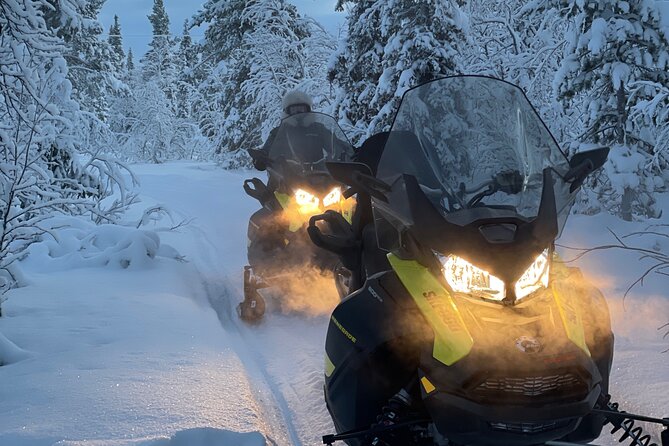 Day tour with snowmobile in Kiruna 10:30 am - Taking Turns on a Snowmobile