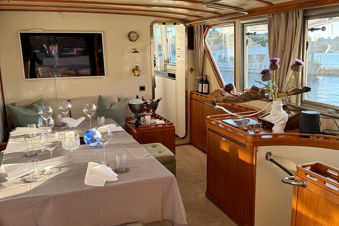 Exclusive Yacht Tour of Stockholm: sunset, dinner, lunch, cruise - Skeppsholmen and Djurgården: green islands in the city