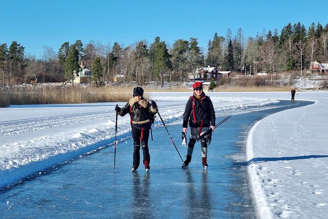 Nordic Ice Skating on a Frozen Lake in Stockholm - Getting onto the ice with help