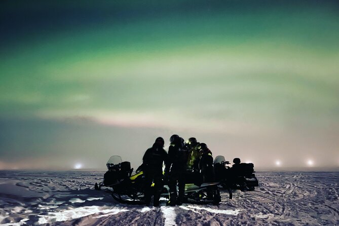 Northern Light snowmobile tour in Kiruna 7:30 pm - Getting ready in borrowed Arctic clothing