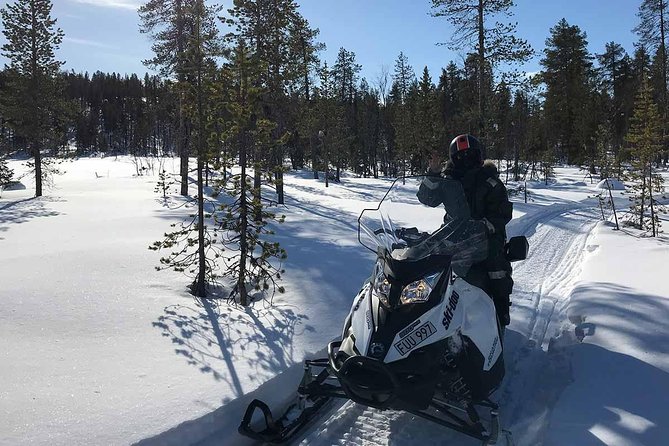Snowmobile Arctic Adventure - Lunch beside the fire in a wooden hut