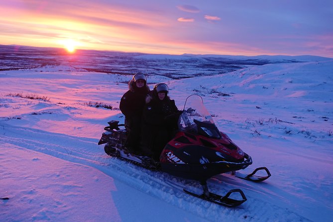 Snowmobile Safari to Lapland viewpoint - Arctic clothing makes a real difference