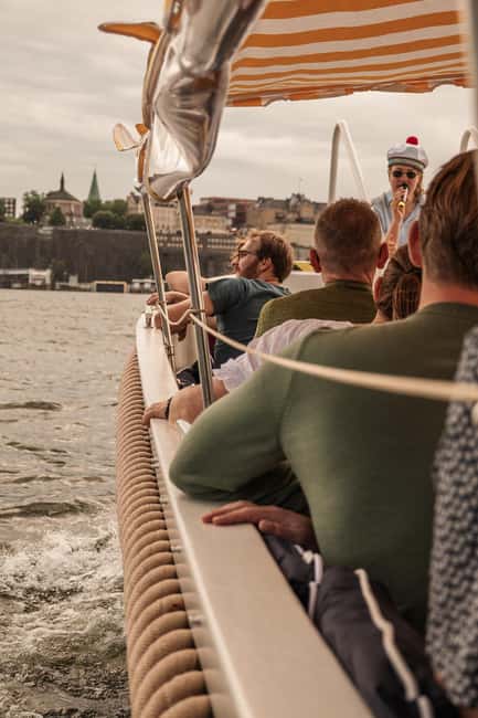 Stockholm: Guided City Sightseeing Open Electric Boat Tour - The guides make the short route work