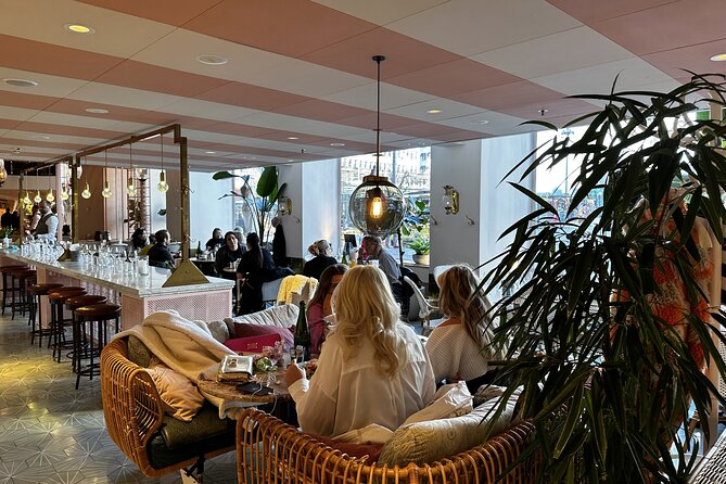 Stockholm Small Group Food Tour with 7 Classic Food Tastings - Crossing Drottninggatan Toward Norrmalm