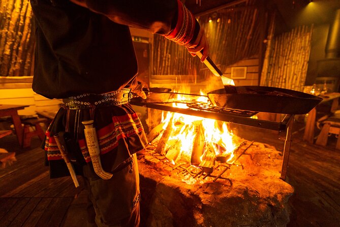 Visit the Sami and Reindeer in a Day Trip from Abisko - Feeding the reindeer with Arctic moss