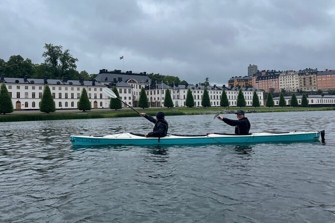 Winter Kayak Tour in Stockholm City (Dry Suit Kayaking) - Launching in a stable tandem kayak